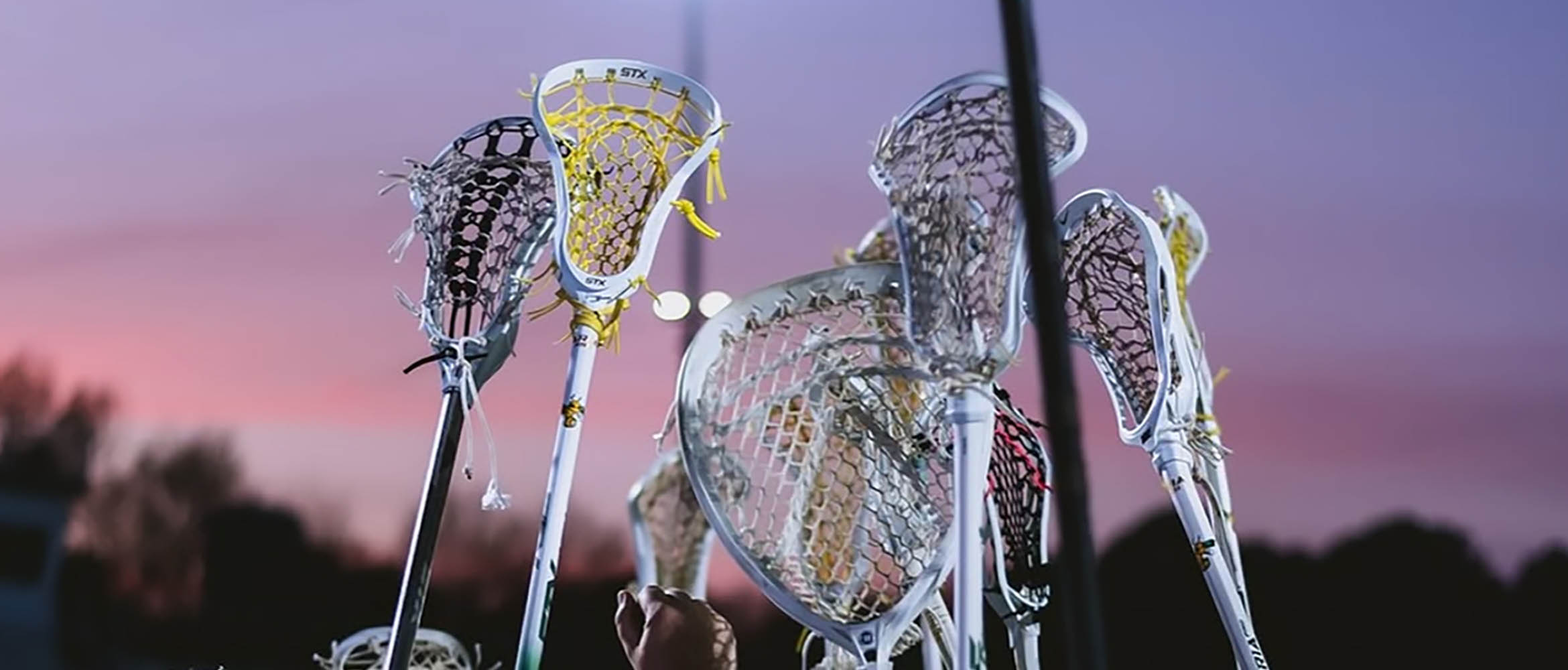 Lacrosse Sticks at sunset